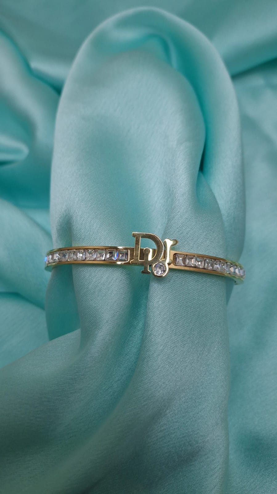 AD STUDDED BRAND BRACELET