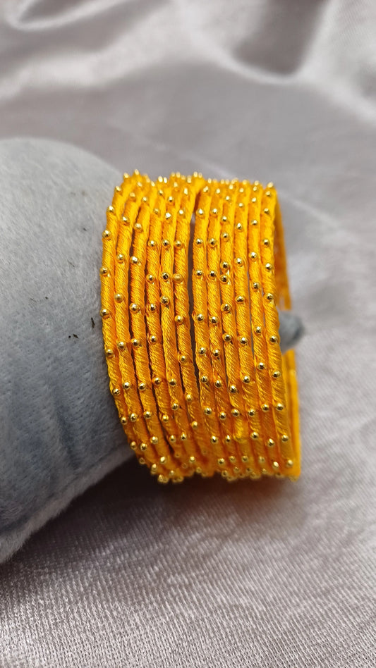 YELLOW SILK THREAD SET OF 12 BANGLES