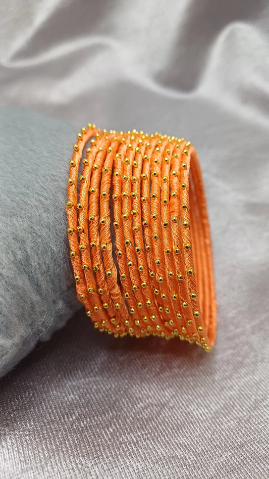 ORANGE SILK THREAD SET OF 12 BANGLES