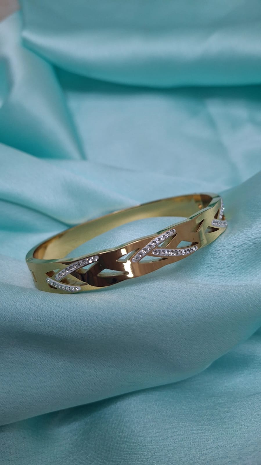 AD STUDDED GOLD BRACELETS