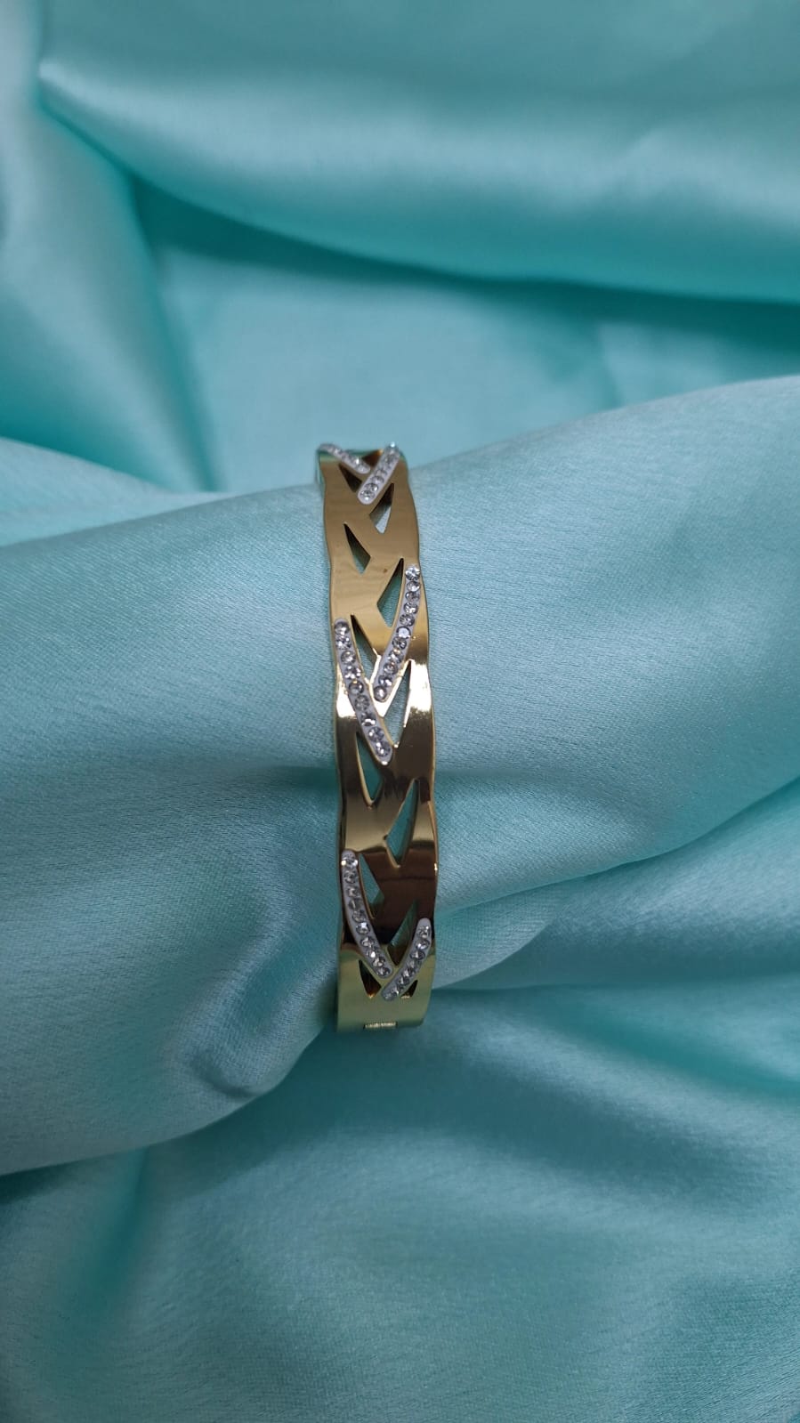 AD STUDDED GOLD BRACELETS