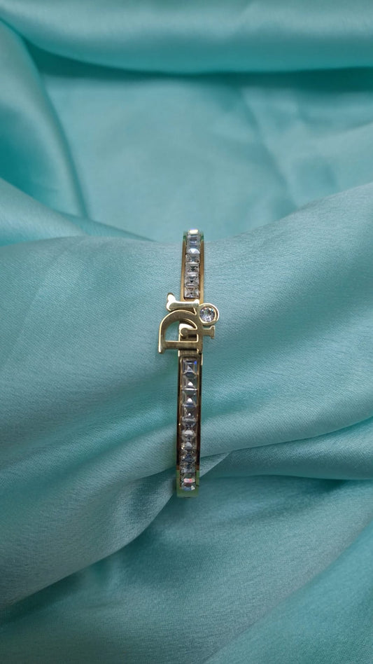 AD STUDDED BRAND BRACELET