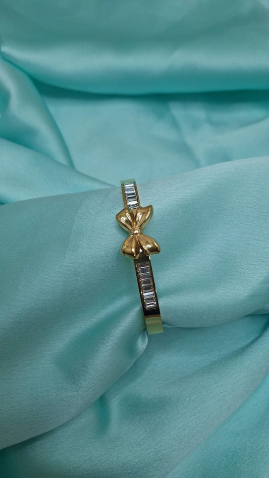 AD STUDDED BOW BRACELET